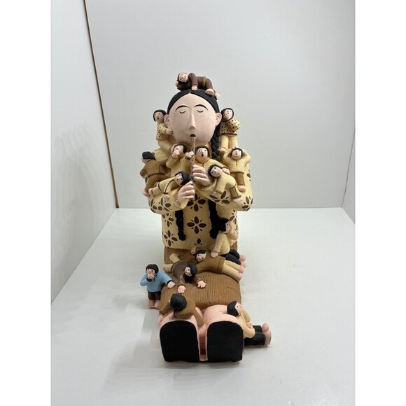 Clay Storyteller Figurine With Multicolored Children & Flute Design - Picture 2 of 12